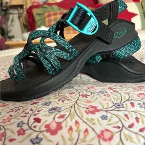 Aqua green and black . Super cute , great for hiking or outings.
